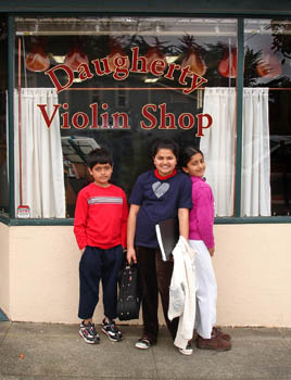 Supreet with cousins - front of shop